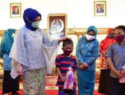 IOM dan Lies F Nurdin Serahkan Bantuan Masker Untuk Anak-anak